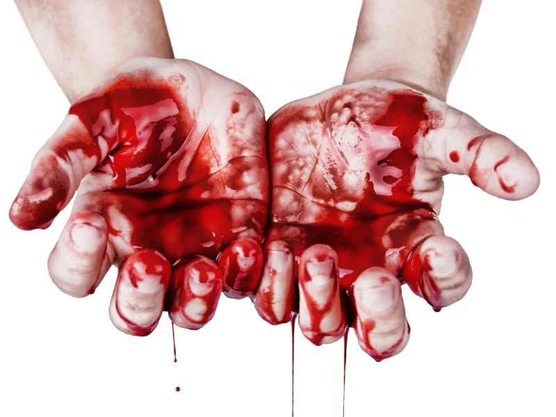 handen onder het bloed